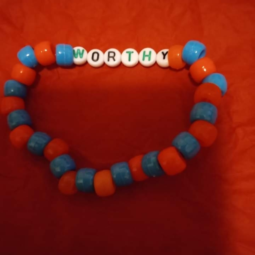 Blue and Orange Beaded Bracelet with 'WORRY' Cubes